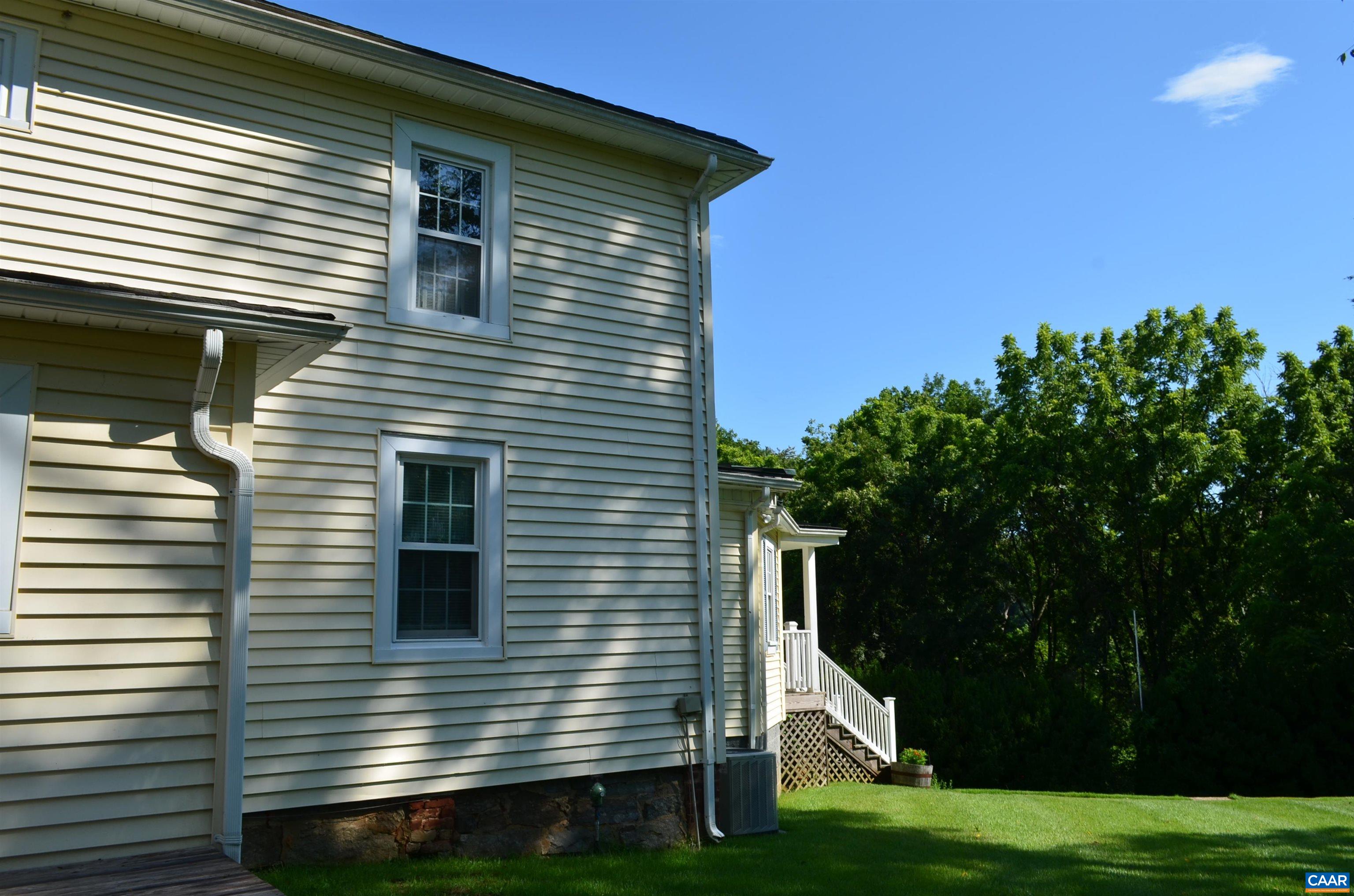10778 Rockfish River Road Shipman, VA 22971 - Photo 12 of 67 a view of a house with backyard and trees