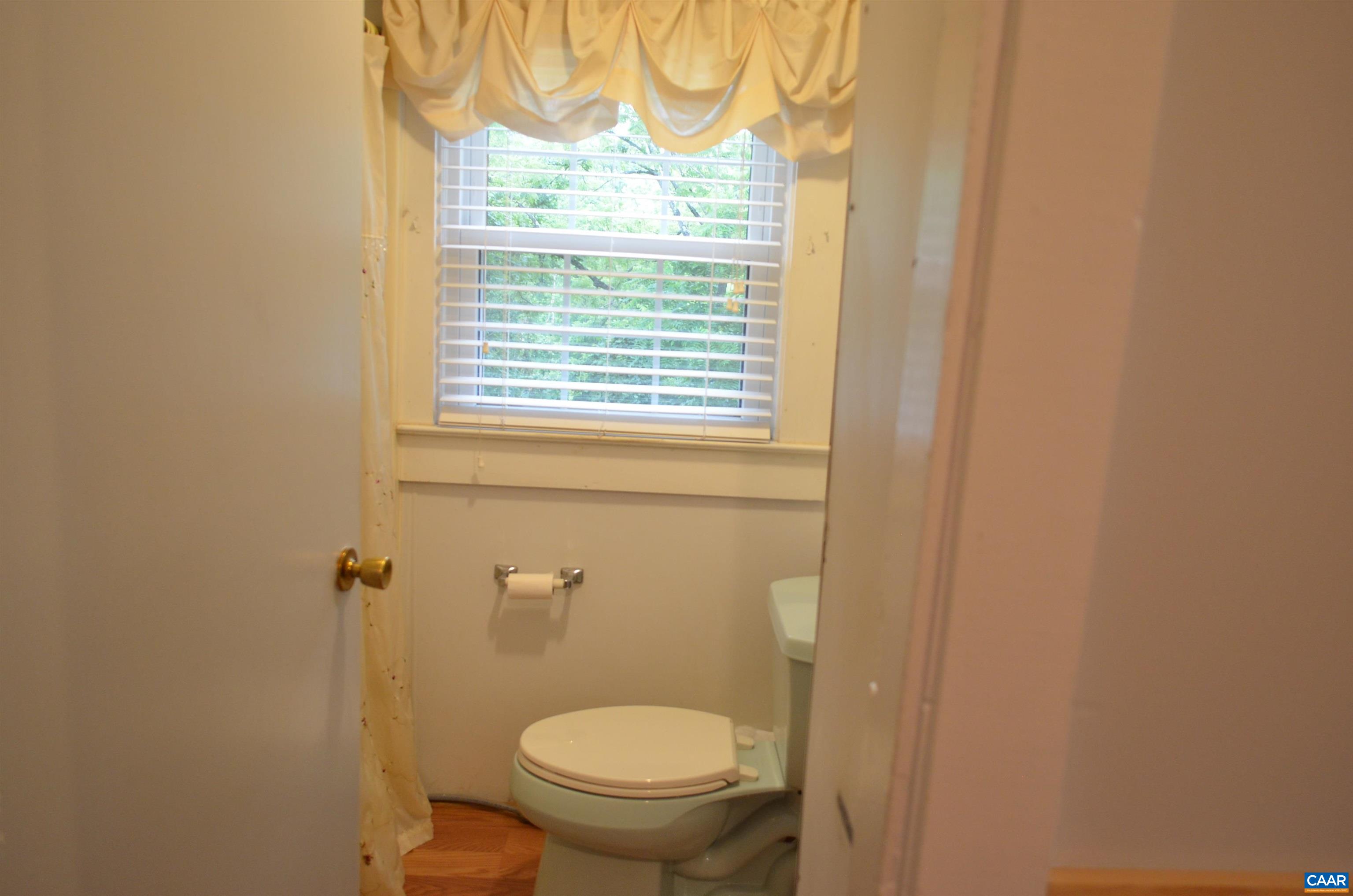 10778 Rockfish River Road Shipman, VA 22971 - Photo 27 of 67 a bathroom with a sink and a toilet