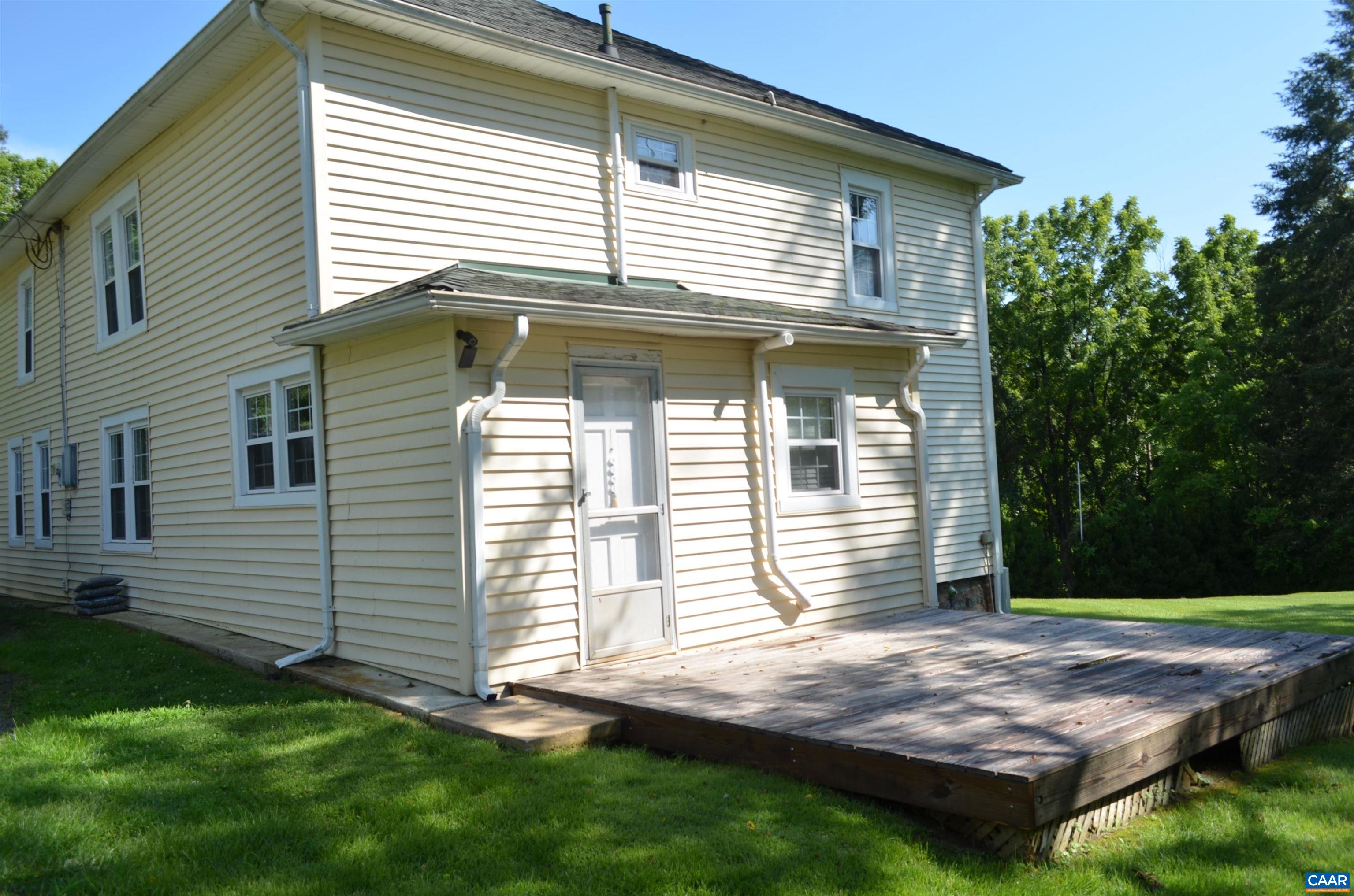 10778 Rockfish River Road Shipman, VA 22971 - Photo 6 of 67 a front view of a house with a yard