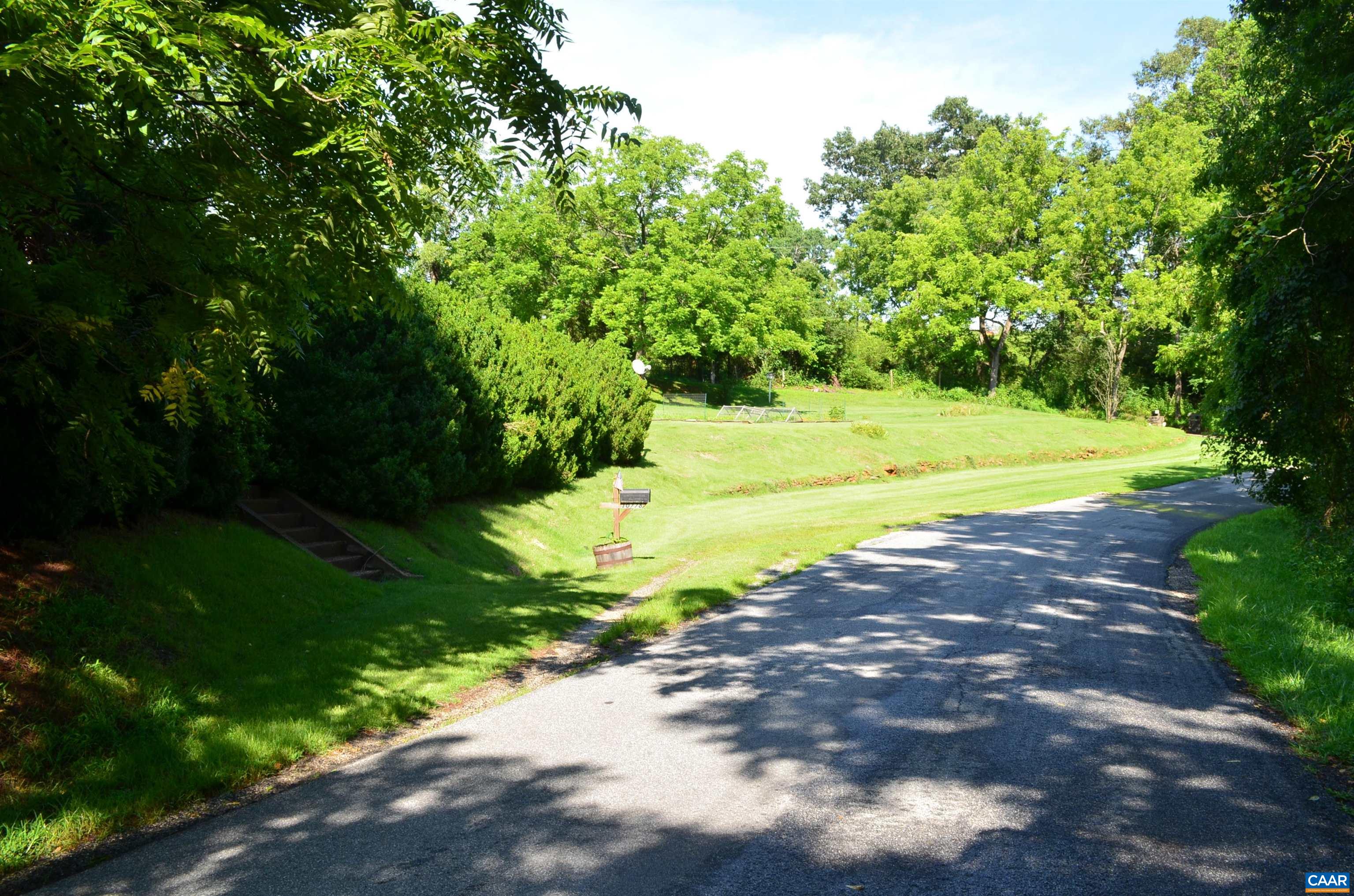 10778 Rockfish River Road Shipman, VA 22971 - Photo 61 of 67 a view of a yard with an outdoor space