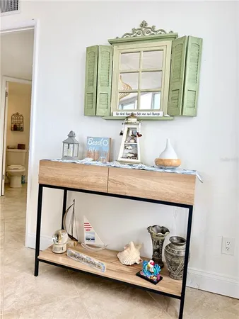 a kitchen with granite countertop a sink counter top space and cabinets
