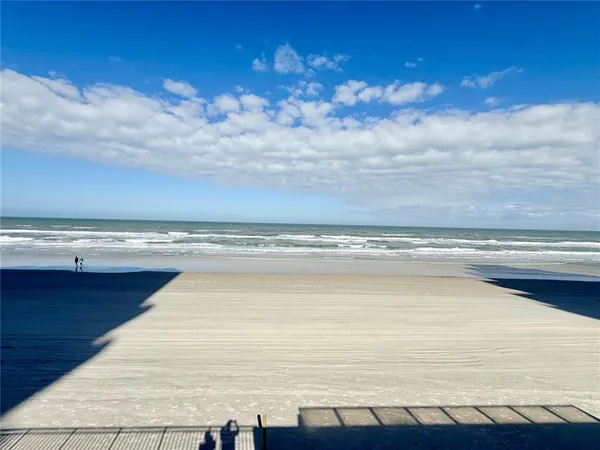 a view of parking with cars parked