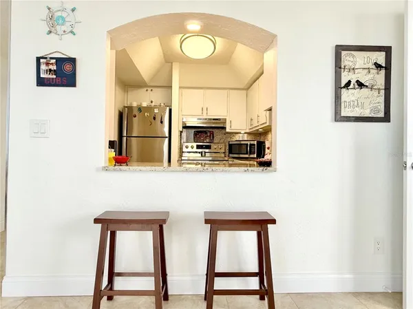 a view of a dining room with furniture