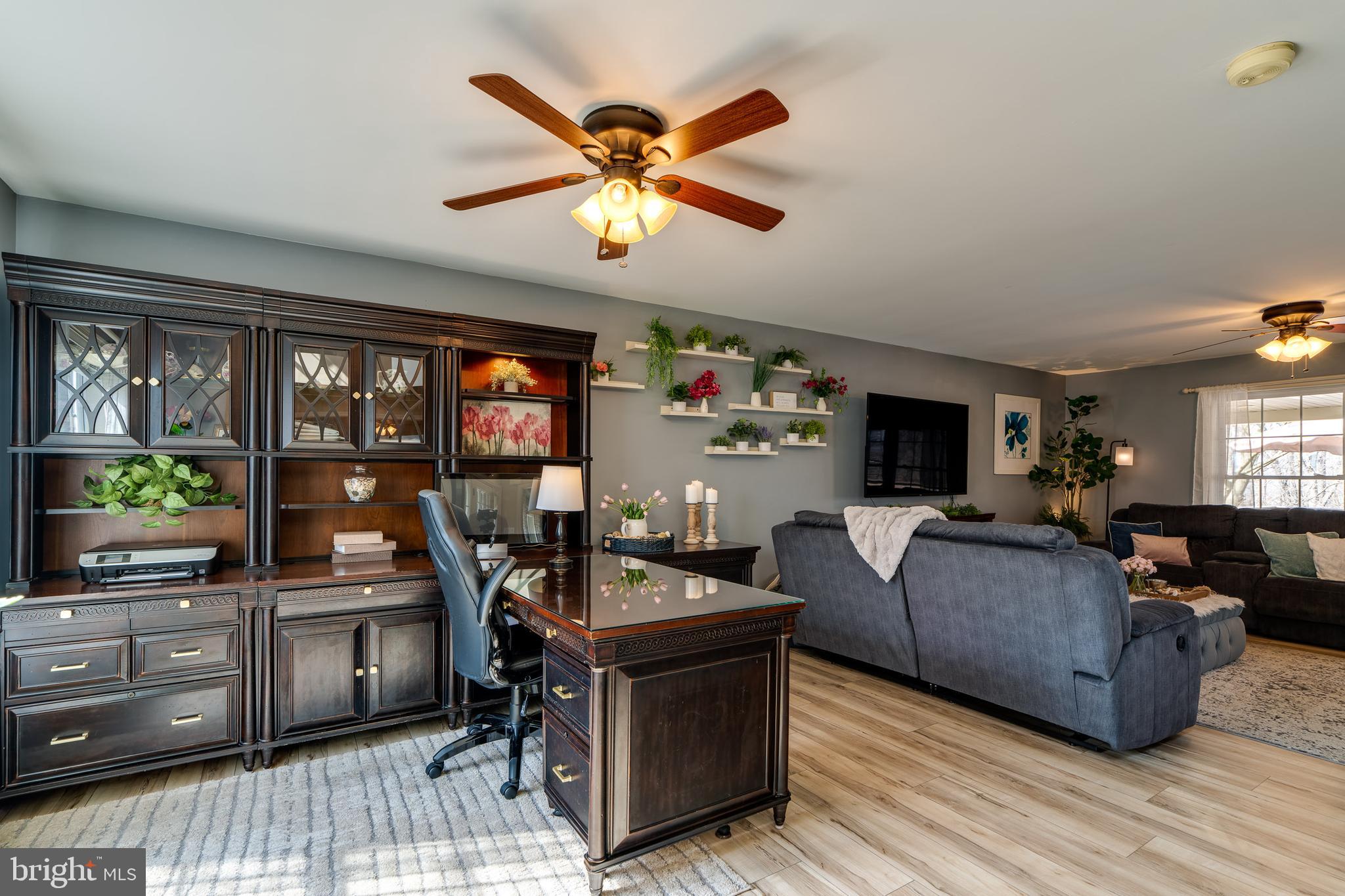 231 Owl Hill Road Lititz, PA 17543 - Photo 26 of 77 a living room with furniture and a flat screen tv