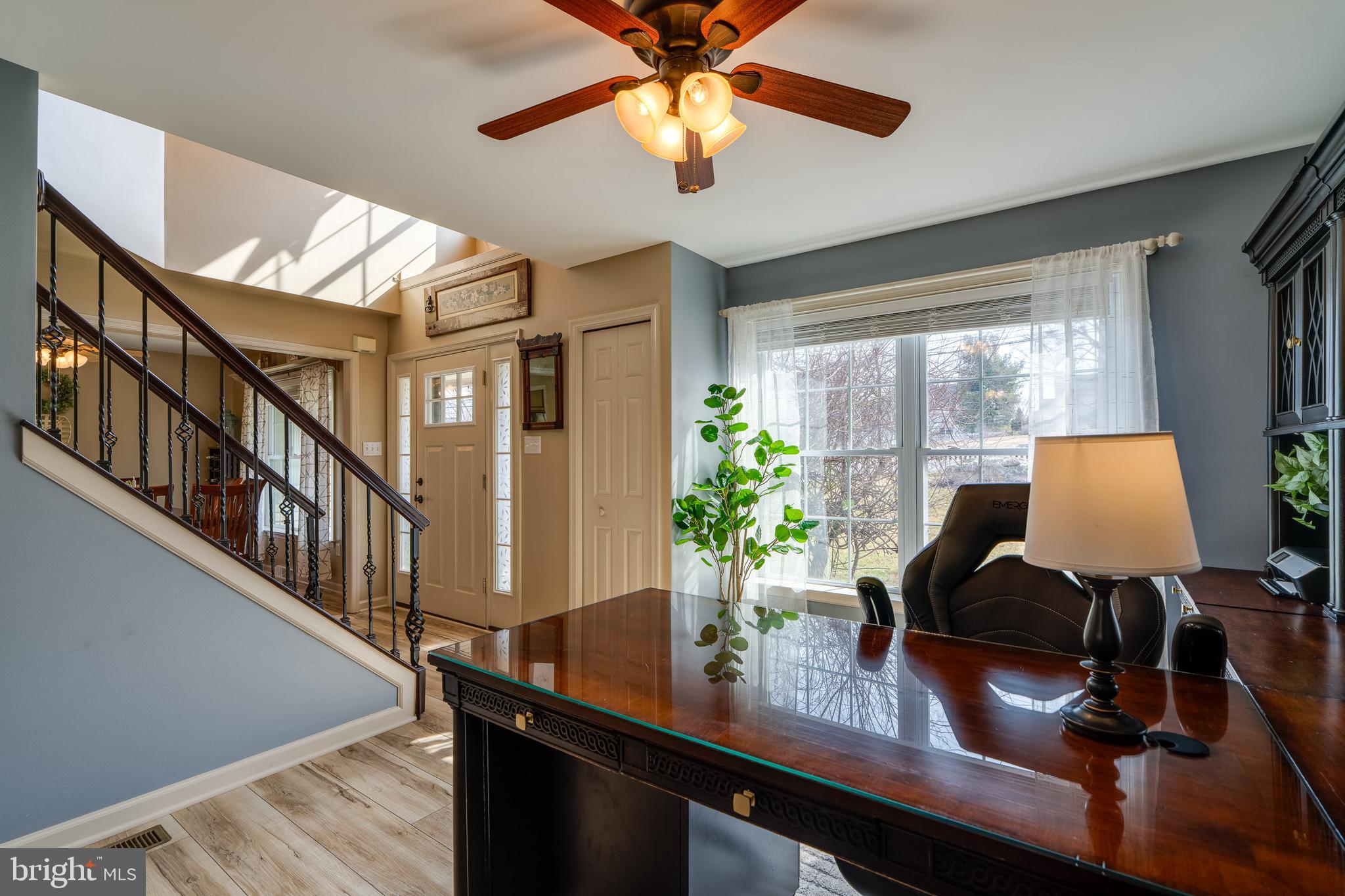 231 Owl Hill Road Lititz, PA 17543 - Photo 28 of 77 a view of a workspace with furniture and a potted plant
