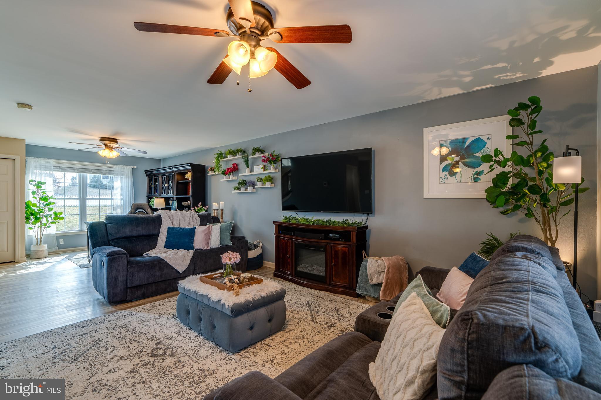 231 Owl Hill Road Lititz, PA 17543 - Photo 32 of 77 a living room with furniture and a flat screen tv