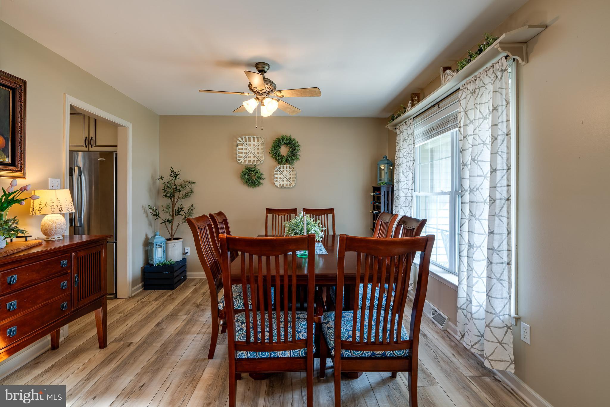 231 Owl Hill Road Lititz, PA 17543 - Photo 33 of 77 a view of a dining room with furniture window and wooden floor