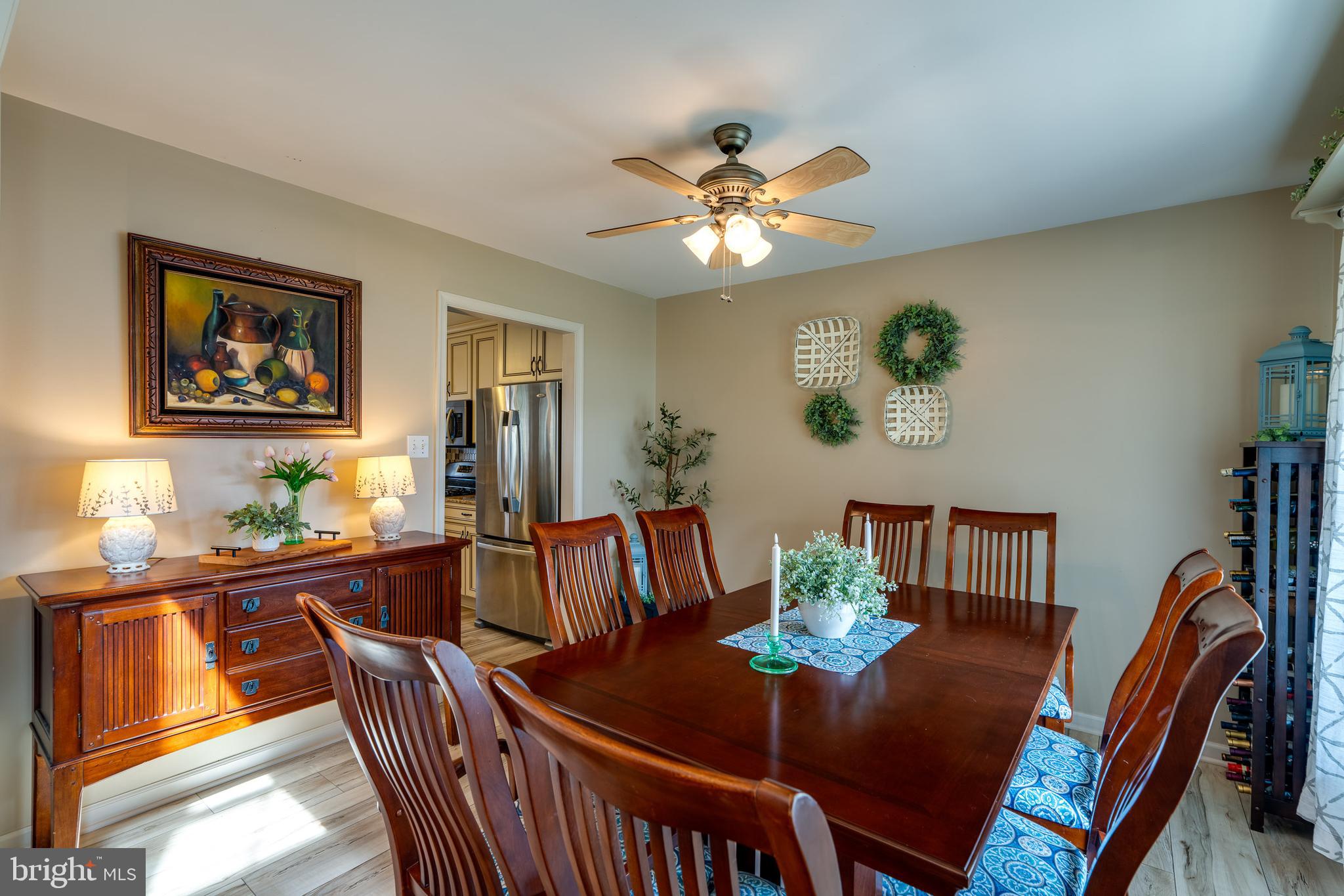 231 Owl Hill Road Lititz, PA 17543 - Photo 34 of 77 a view of a dining room with furniture wooden floor and a chandelier
