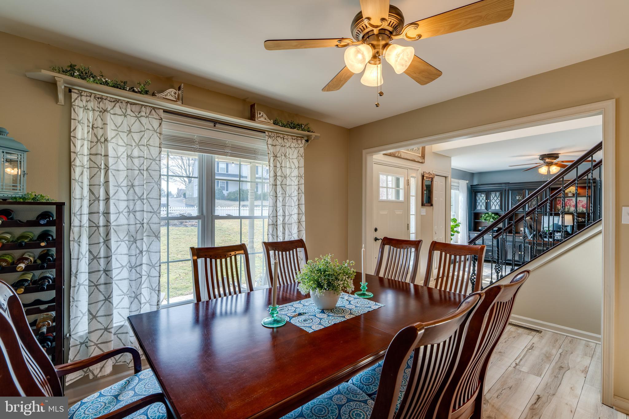 231 Owl Hill Road Lititz, PA 17543 - Photo 35 of 77 a view of a dining room with furniture window and wooden floor