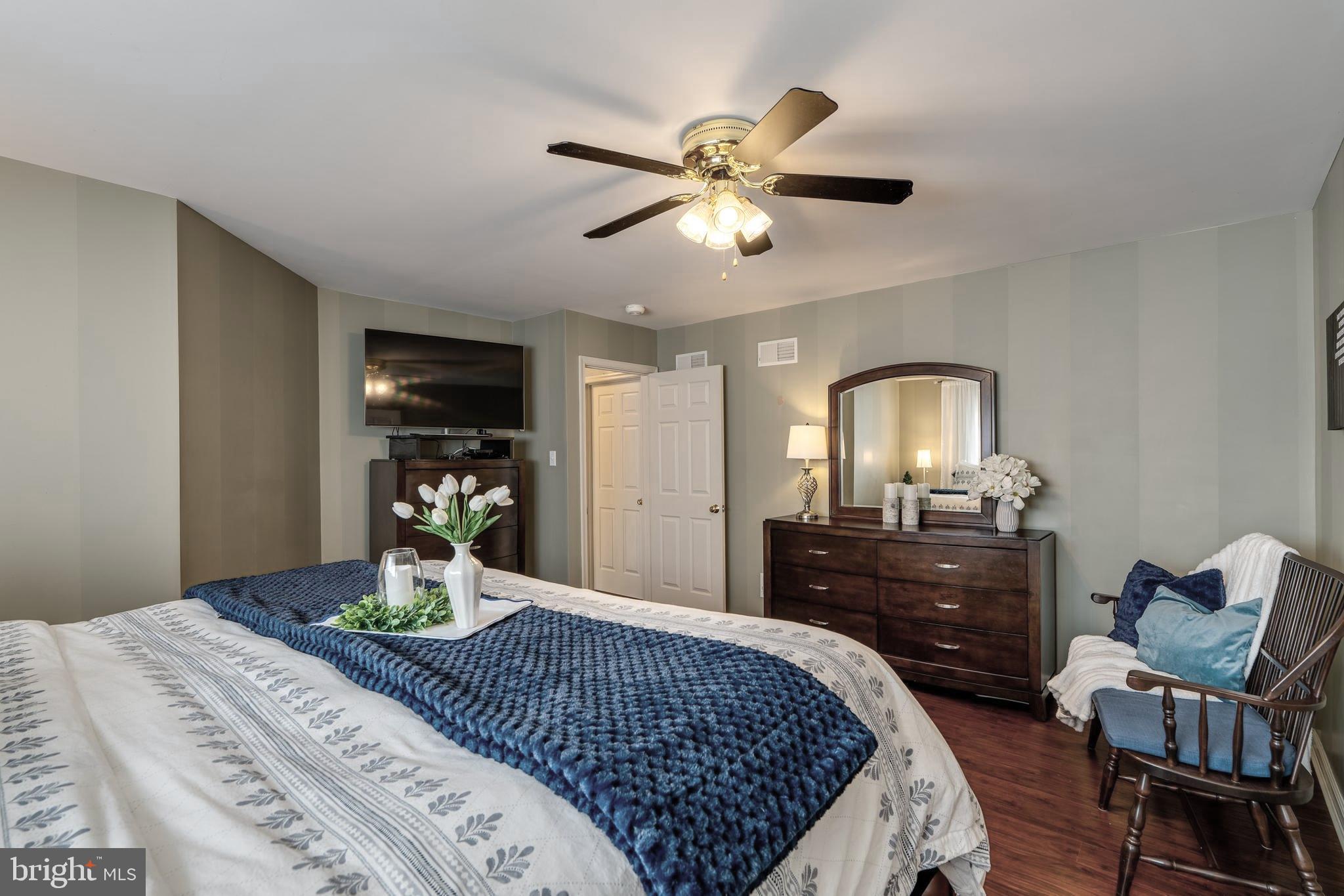 231 Owl Hill Road Lititz, PA 17543 - Photo 49 of 77 a bedroom with a bed and a dresser