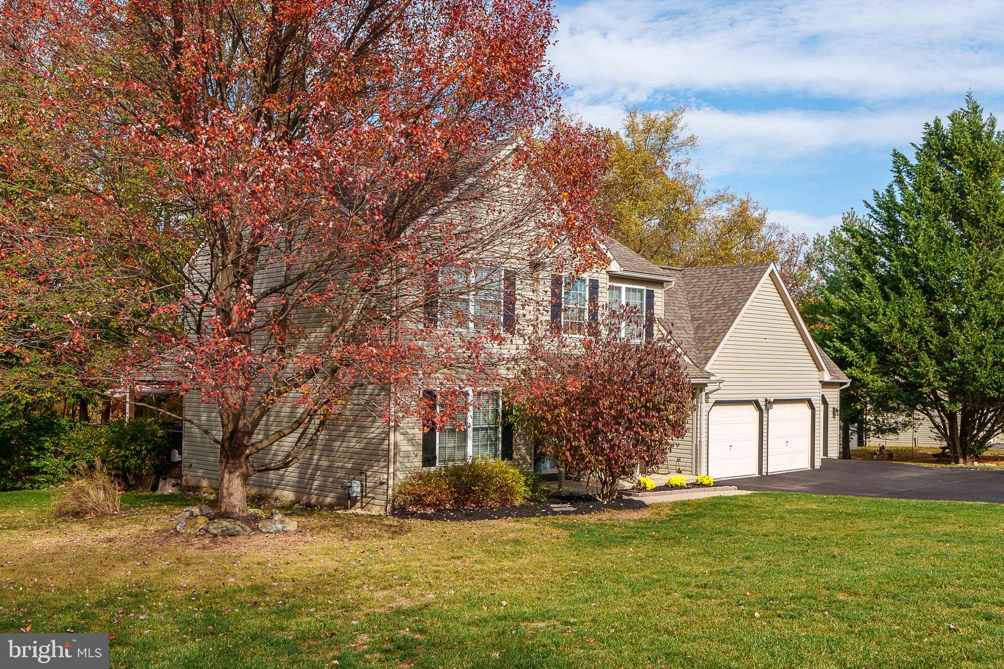 231 Owl Hill Road Lititz, PA 17543 - Photo 5 of 77 a front view of a house with a garden and trees