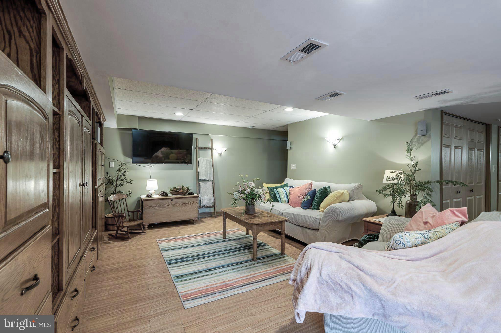 231 Owl Hill Road Lititz, PA 17543 - Photo 62 of 77 a living room with furniture and a flat screen tv