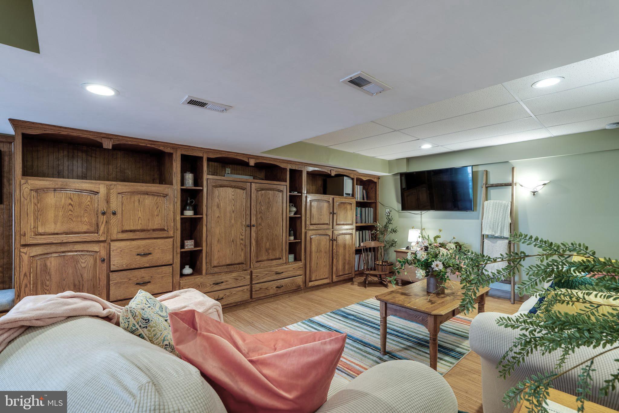 231 Owl Hill Road Lititz, PA 17543 - Photo 64 of 77 a living room with furniture and a flat screen tv