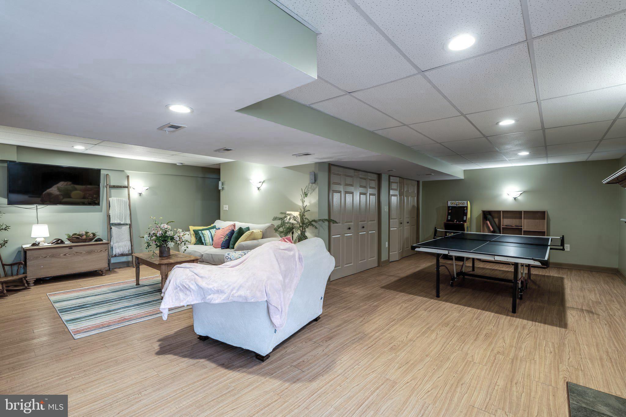 231 Owl Hill Road Lititz, PA 17543 - Photo 65 of 77 a living room with furniture and a flat screen tv