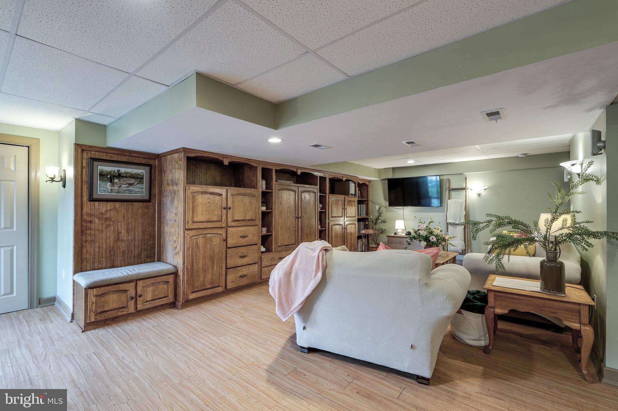 231 Owl Hill Road Lititz, PA 17543 - Photo 66 of 77 a living room with furniture and a flat screen tv