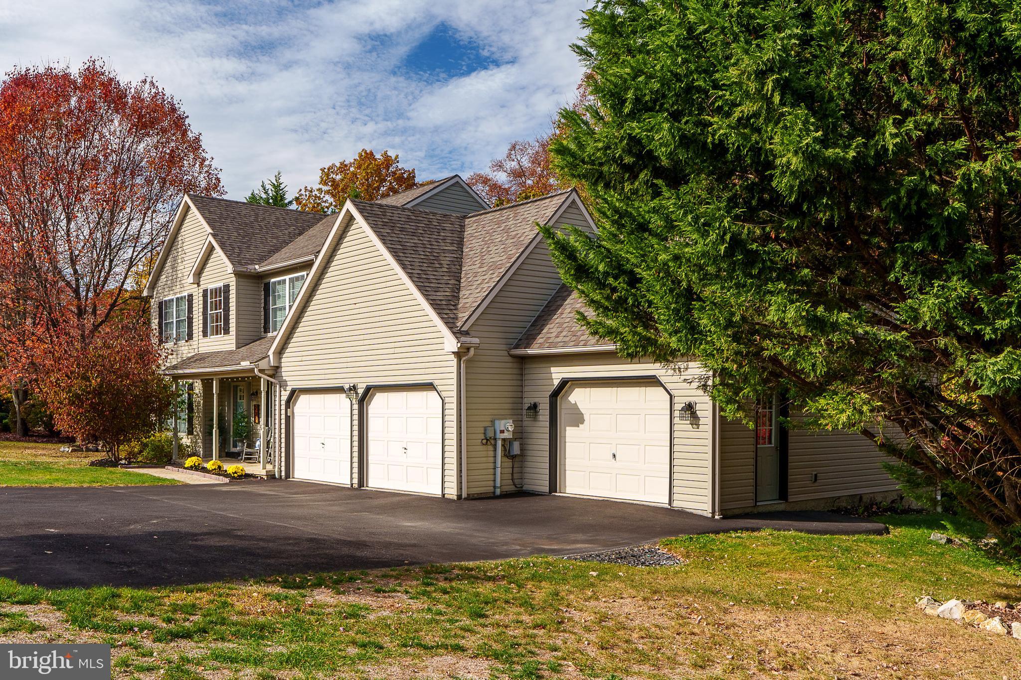 231 Owl Hill Road Lititz, PA 17543 - Photo 76 of 77 a view of a white house with a big yard and large tree