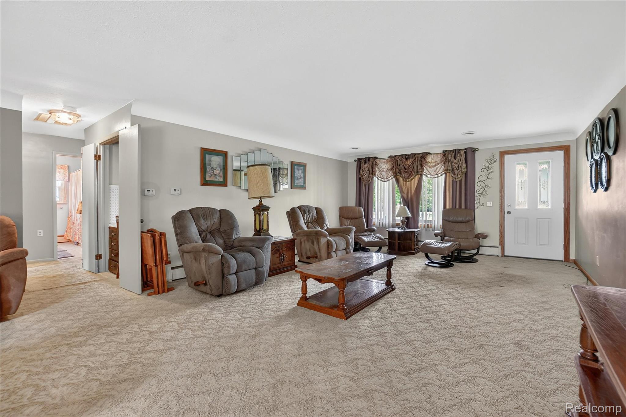 7358 Morrish Road Swartz Creek, MI 48473 - Photo 9 of 39 Living room with carpet flooring