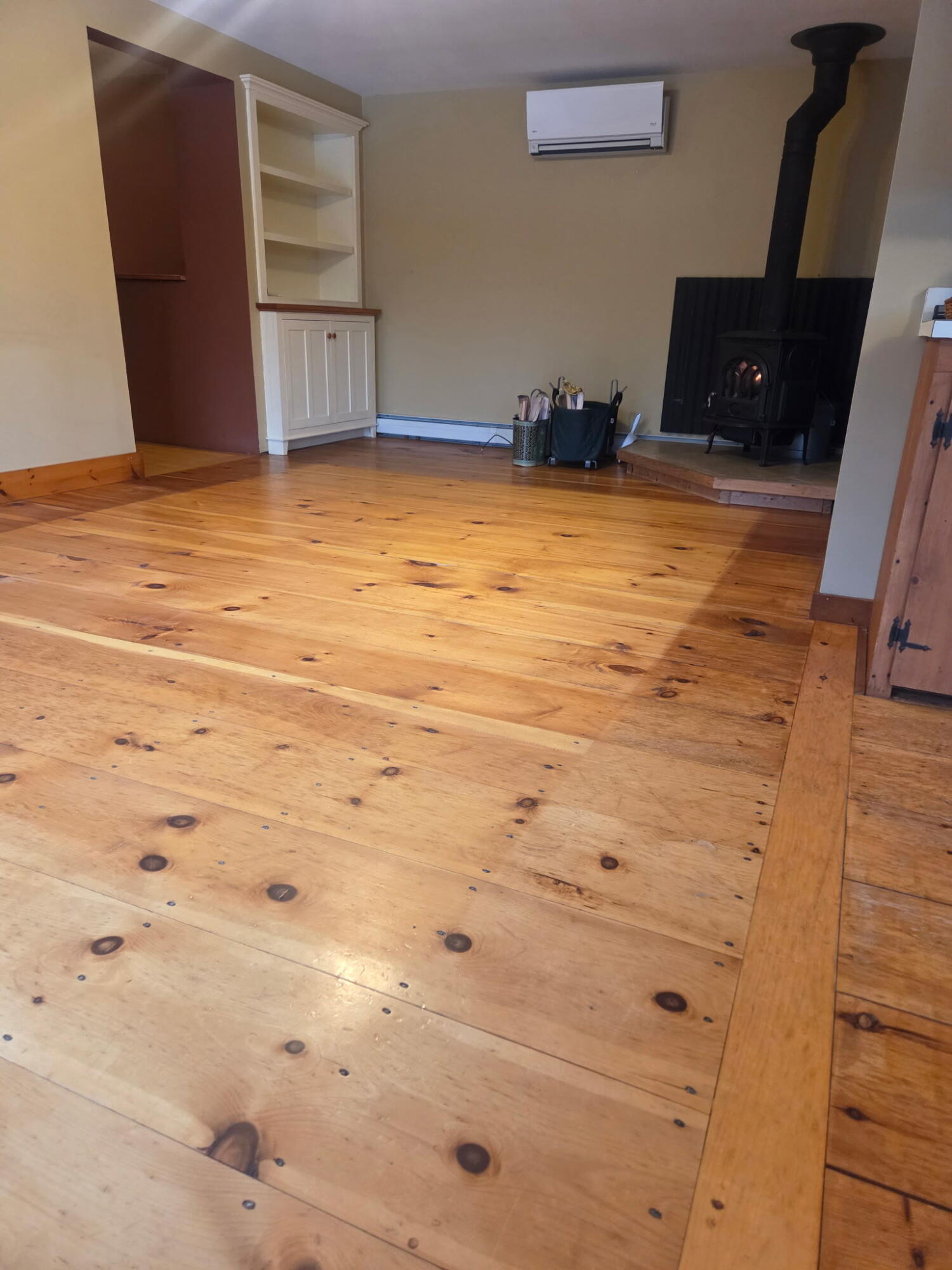 406 Industry Road Farmington, ME 04938 - Photo 23 of 59 Living room - wide knotty pine floors!