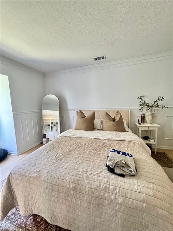 24311 Plantation Drive Northeast Atlanta, GA 30324 - Photo 12 of 31 a bedroom with a bed and window