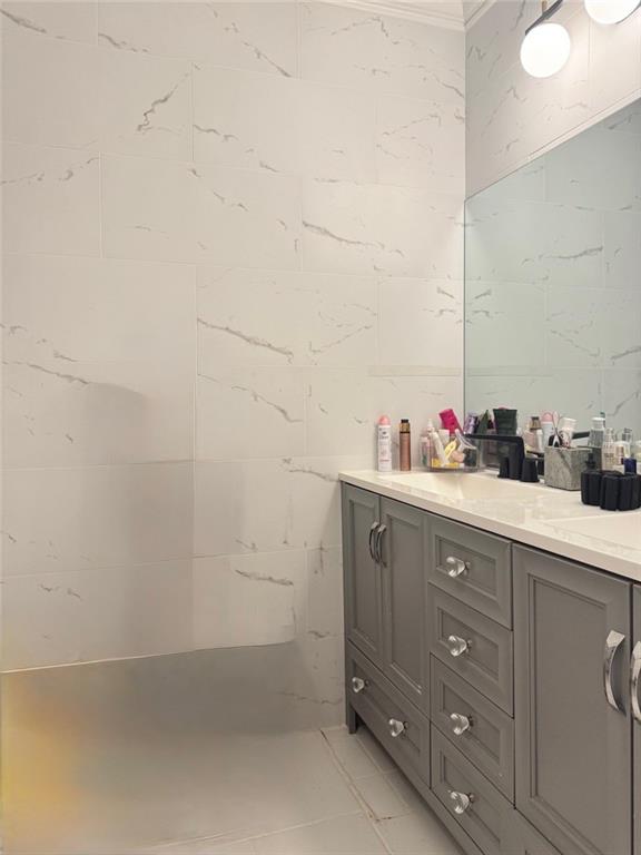 24311 Plantation Drive Northeast Atlanta, GA 30324 - Photo 22 of 31 a bathroom with a sink and vanity