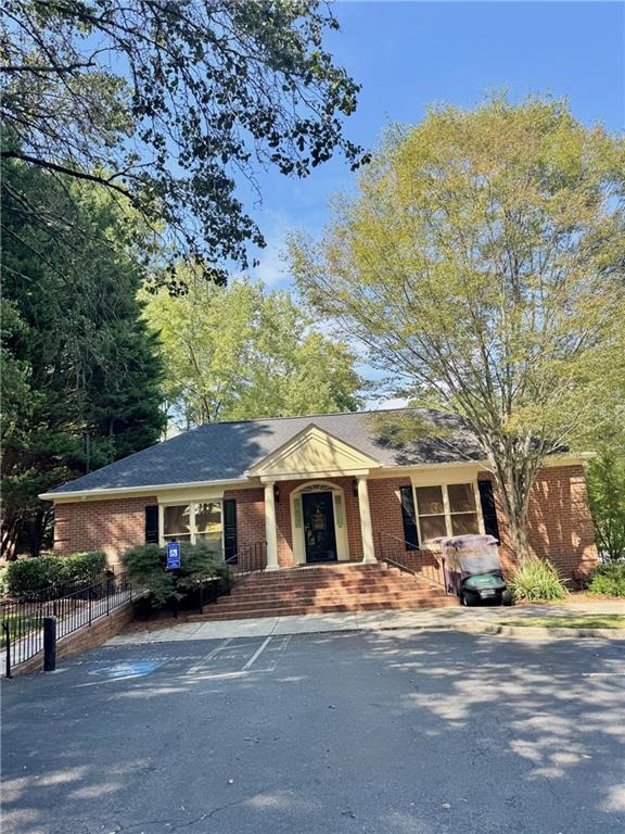 24311 Plantation Drive Northeast Atlanta, GA 30324 - Photo 31 of 31 a front view of a house with a yard