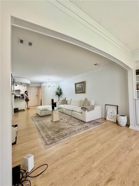 24311 Plantation Drive Northeast Atlanta, GA 30324 - Photo 7 of 31 a living room with kitchen island and furniture