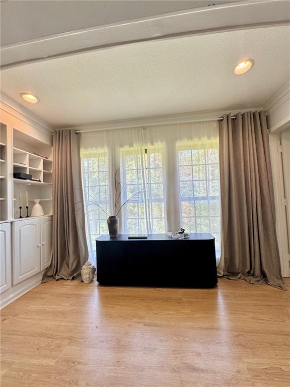 24311 Plantation Drive Northeast Atlanta, GA 30324 - Photo 9 of 31 a view of a living room with a flat screen tv and floor to ceiling window
