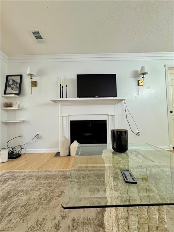 24311 Plantation Drive Northeast Atlanta, GA 30324 - Photo 10 of 31 a living room with furniture and a fireplace