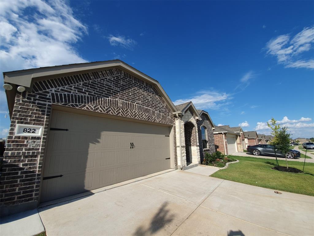 822 Spruce Lane Princeton, TX 75407 - Photo 2 of 35 a view of a building with a street