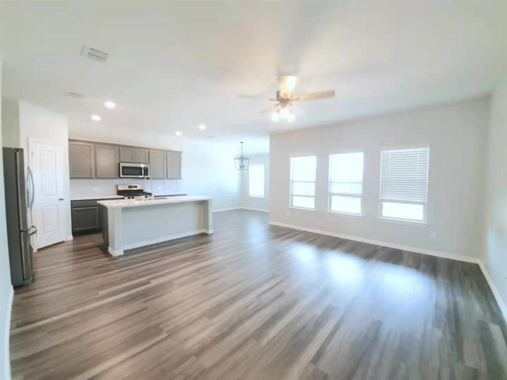 822 Spruce Lane Princeton, TX 75407 - Photo 21 of 35 a view of kitchen with sink and wooden floor