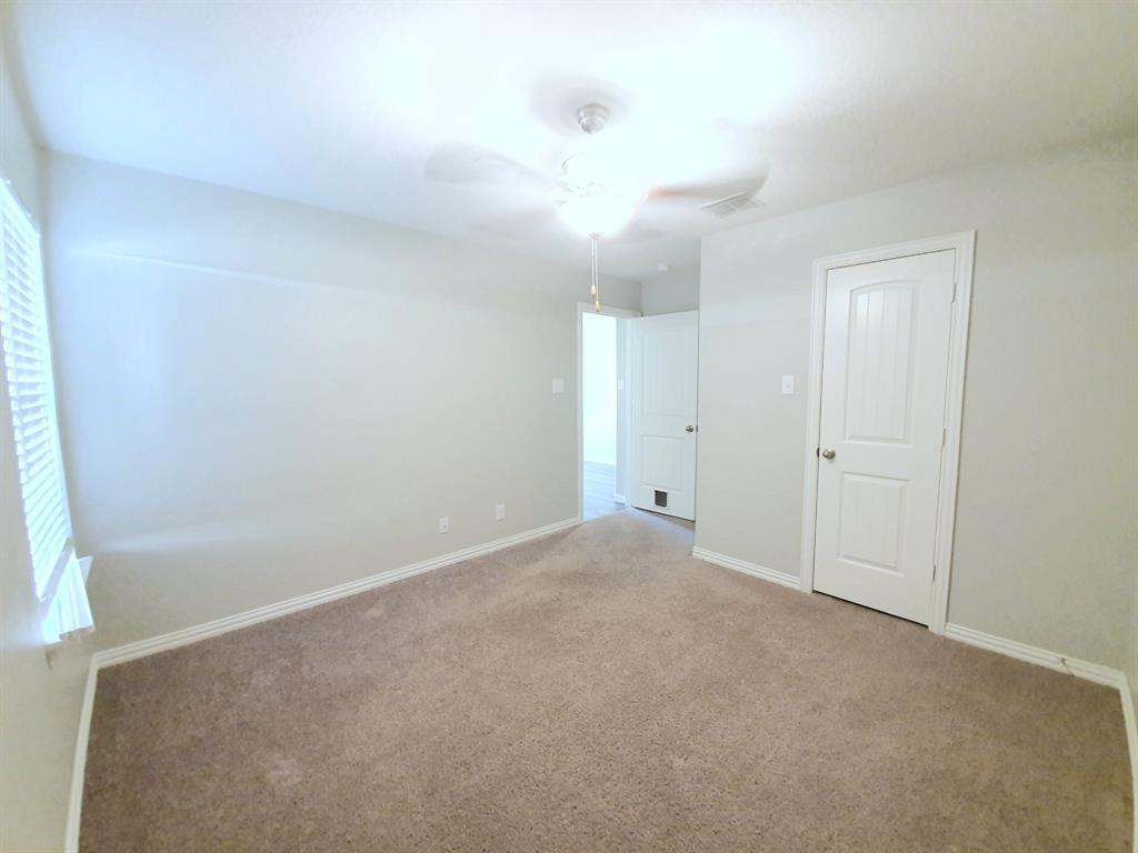 822 Spruce Lane Princeton, TX 75407 - Photo 27 of 35 a view of an empty room