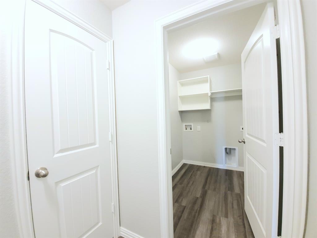 822 Spruce Lane Princeton, TX 75407 - Photo 32 of 35 a bathroom with a bathtub