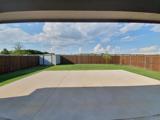 a view of outdoor space and yard