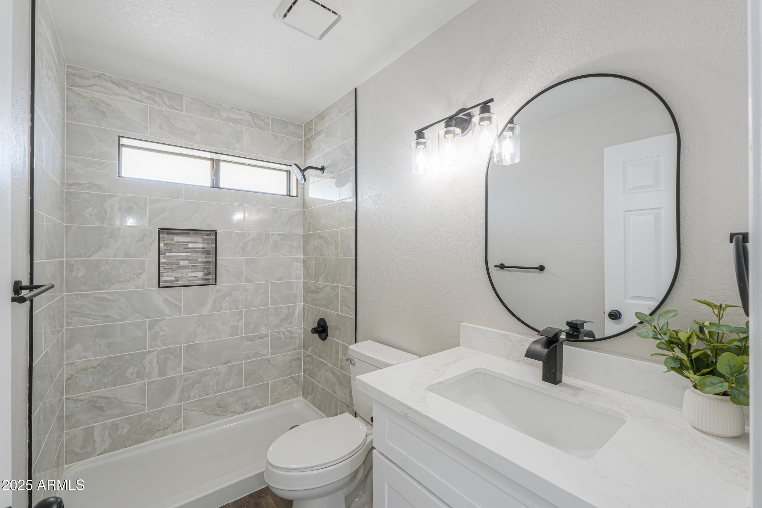 15741 Coral Road Arizona City, AZ 85123 - Photo 14 of 32 a bathroom with a sink toilet and shower
