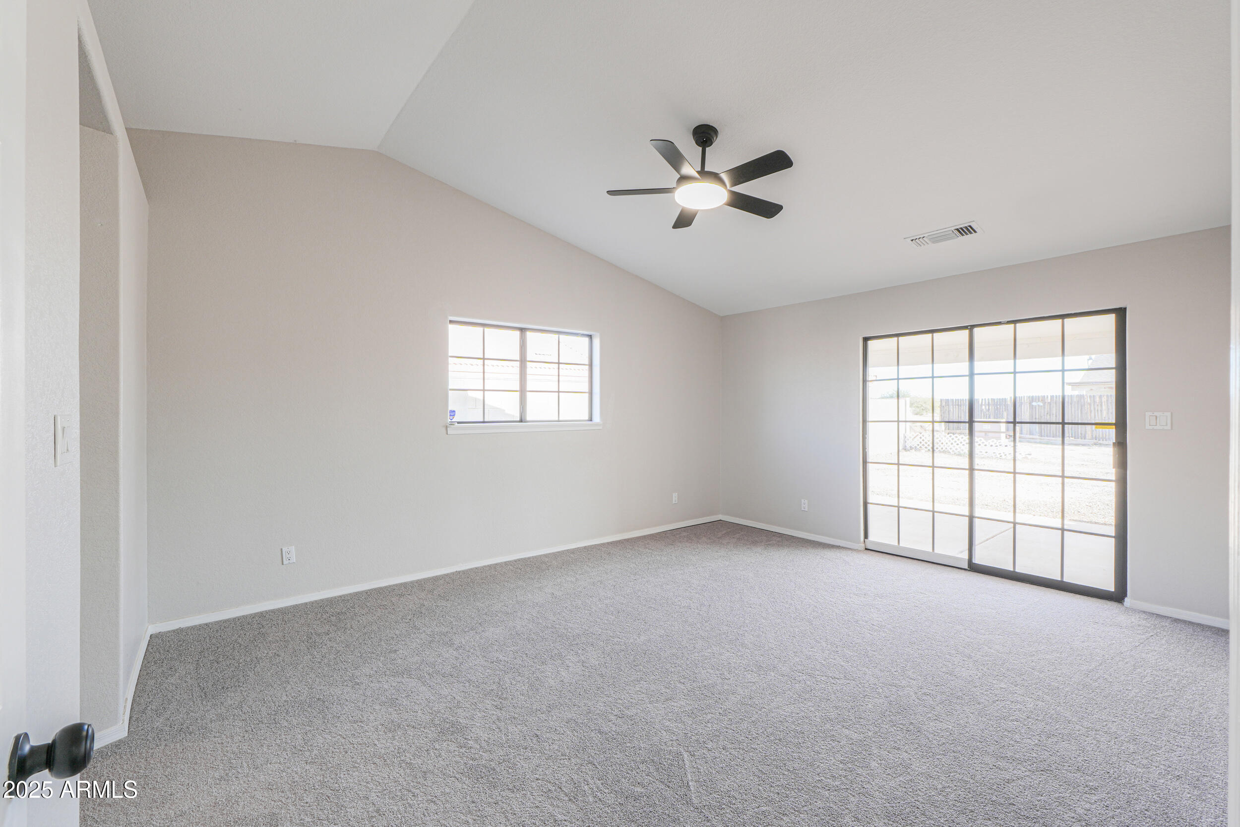 15741 Coral Road Arizona City, AZ 85123 - Photo 17 of 32 a view of an empty room with a window