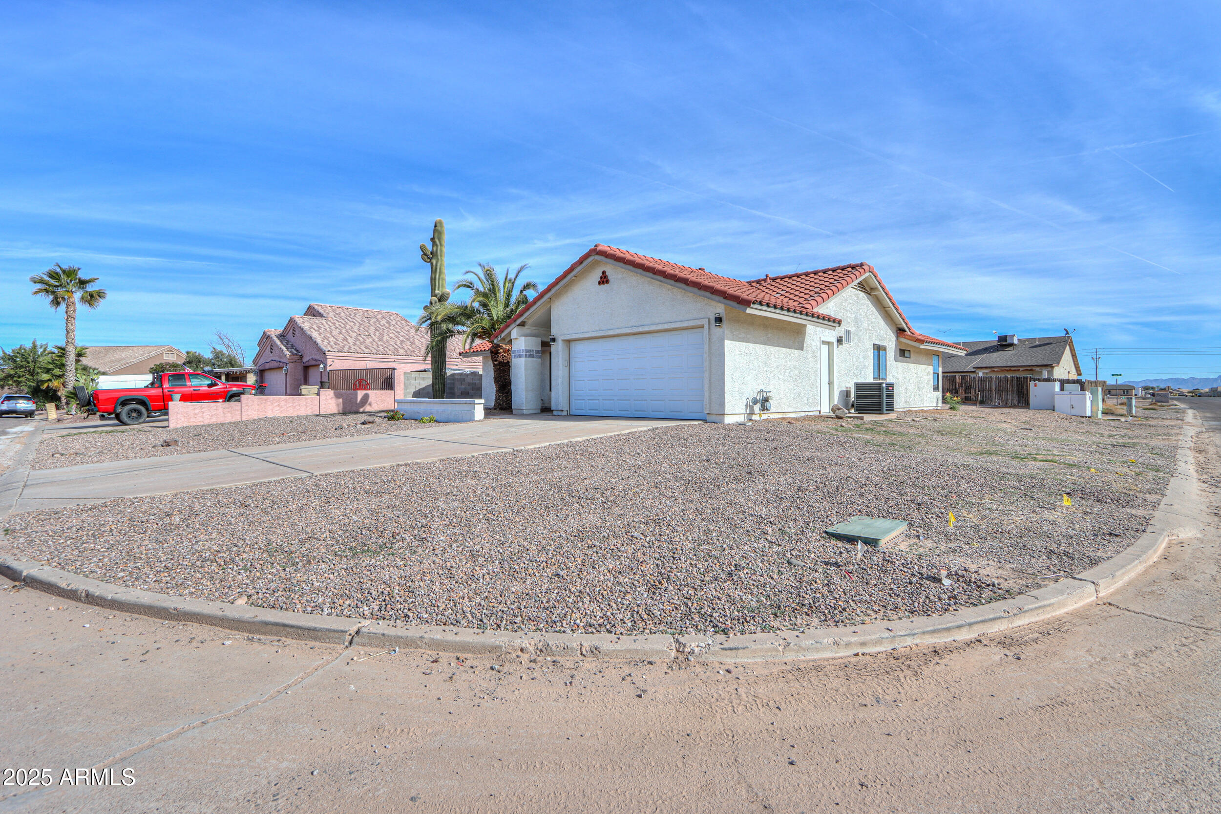 15741 Coral Road Arizona City, AZ 85123 - Photo 2 of 32 a view of a house with a outdoor space