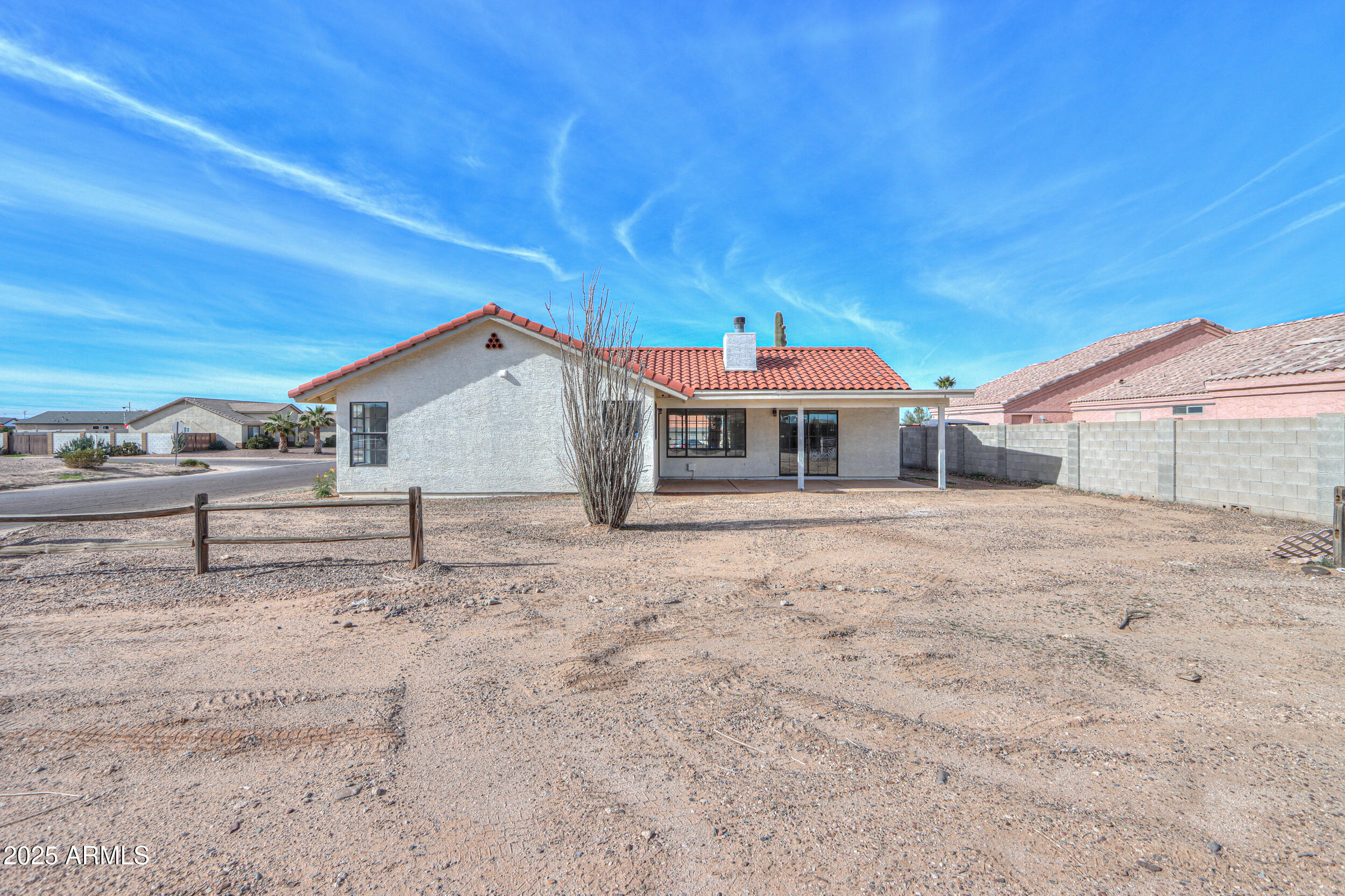 15741 Coral Road Arizona City, AZ 85123 - Photo 27 of 32 a view of a house with a snow in the yard