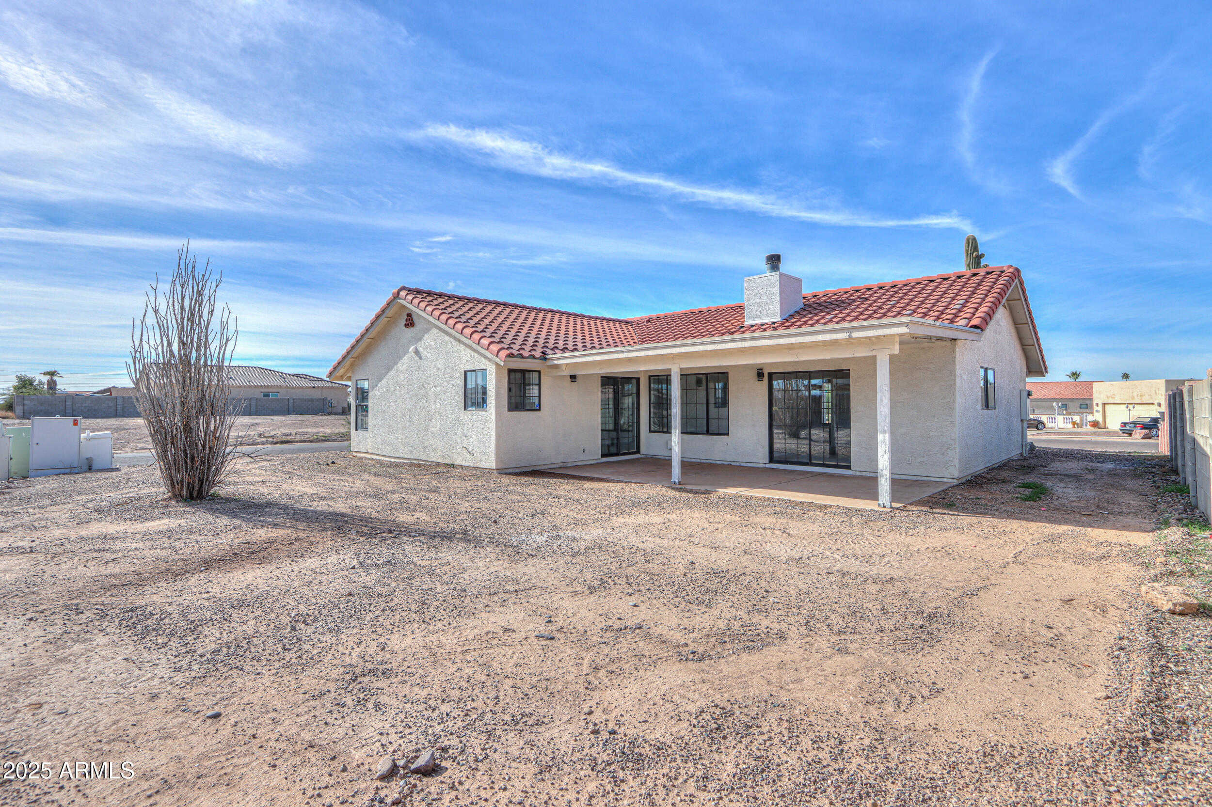 15741 Coral Road Arizona City, AZ 85123 - Photo 28 of 32 a view of a house with a yard