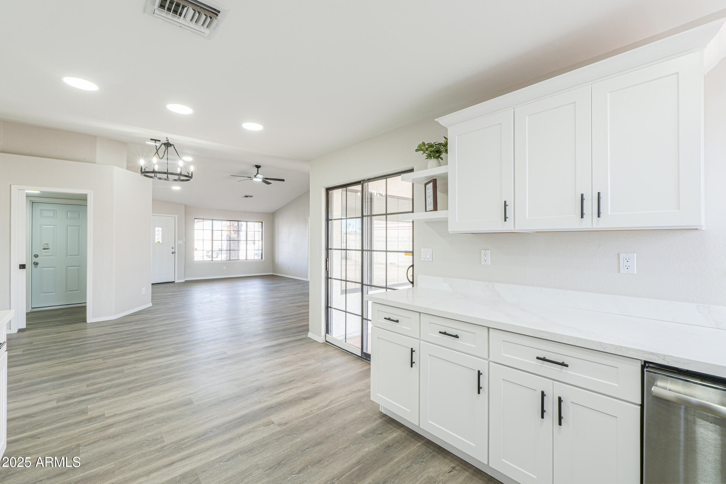 15741 Coral Road Arizona City, AZ 85123 - Photo 10 of 32 a view of a kitchen with wooden floor