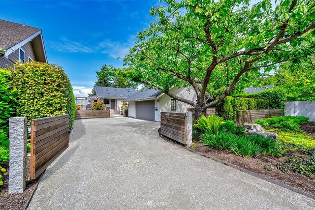 a view of house with outdoor space and street view