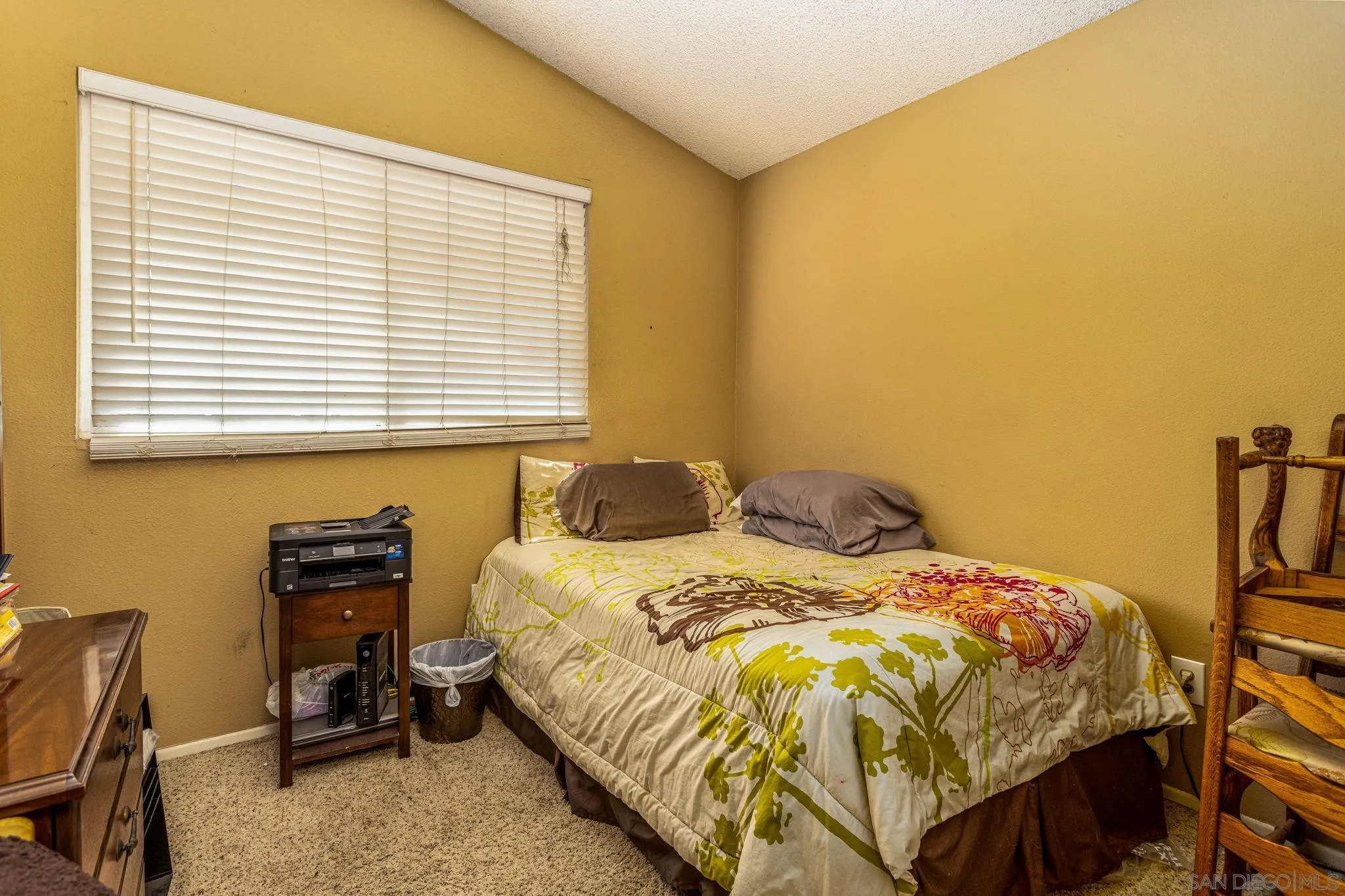 4648 Valley Glen Drive Corona, CA 92878 - Photo 19 of 42 a bedroom with a bed and a window