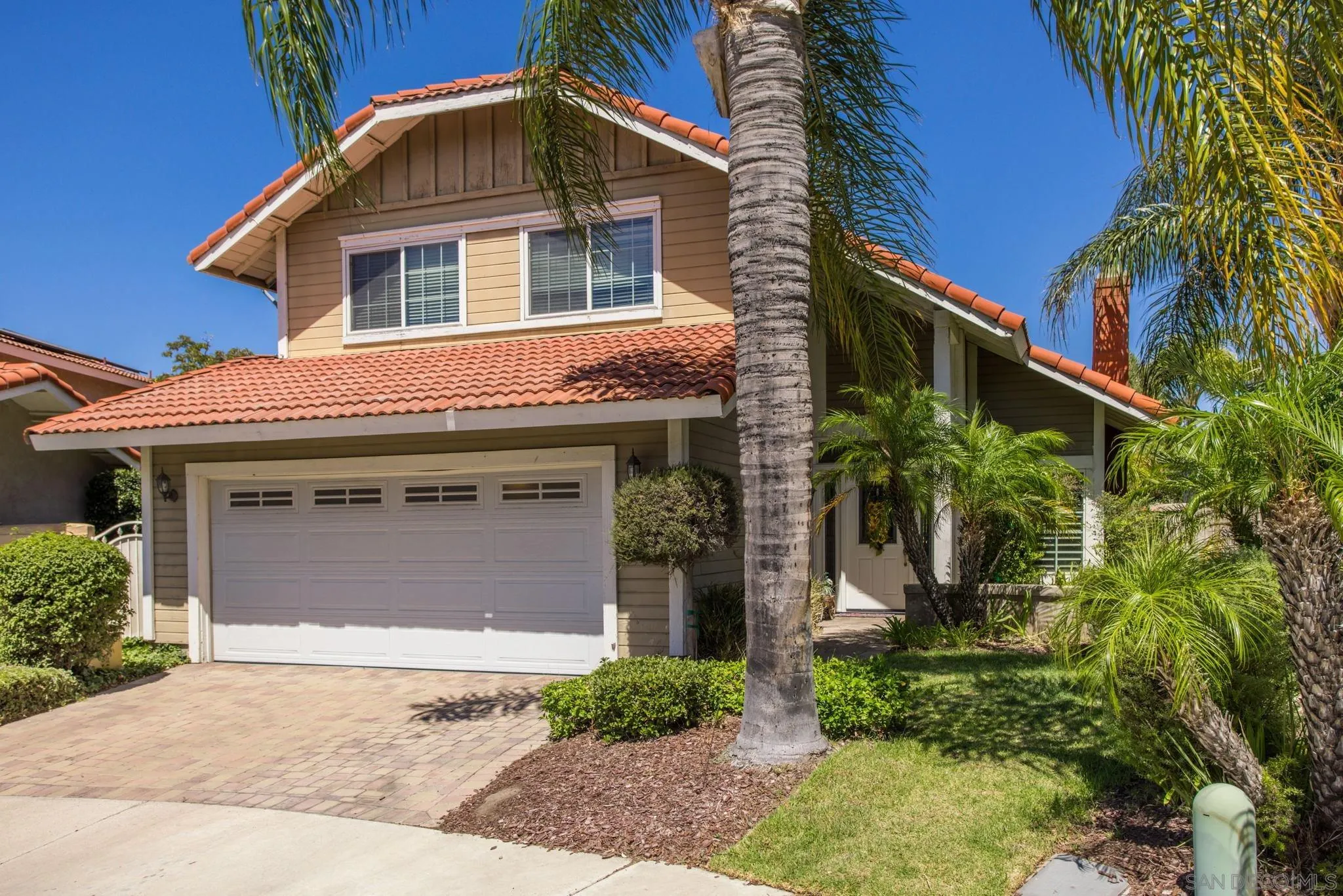 4648 Valley Glen Drive Corona, CA 92878 - Photo 2 of 42 a front view of a house with a yard and garage