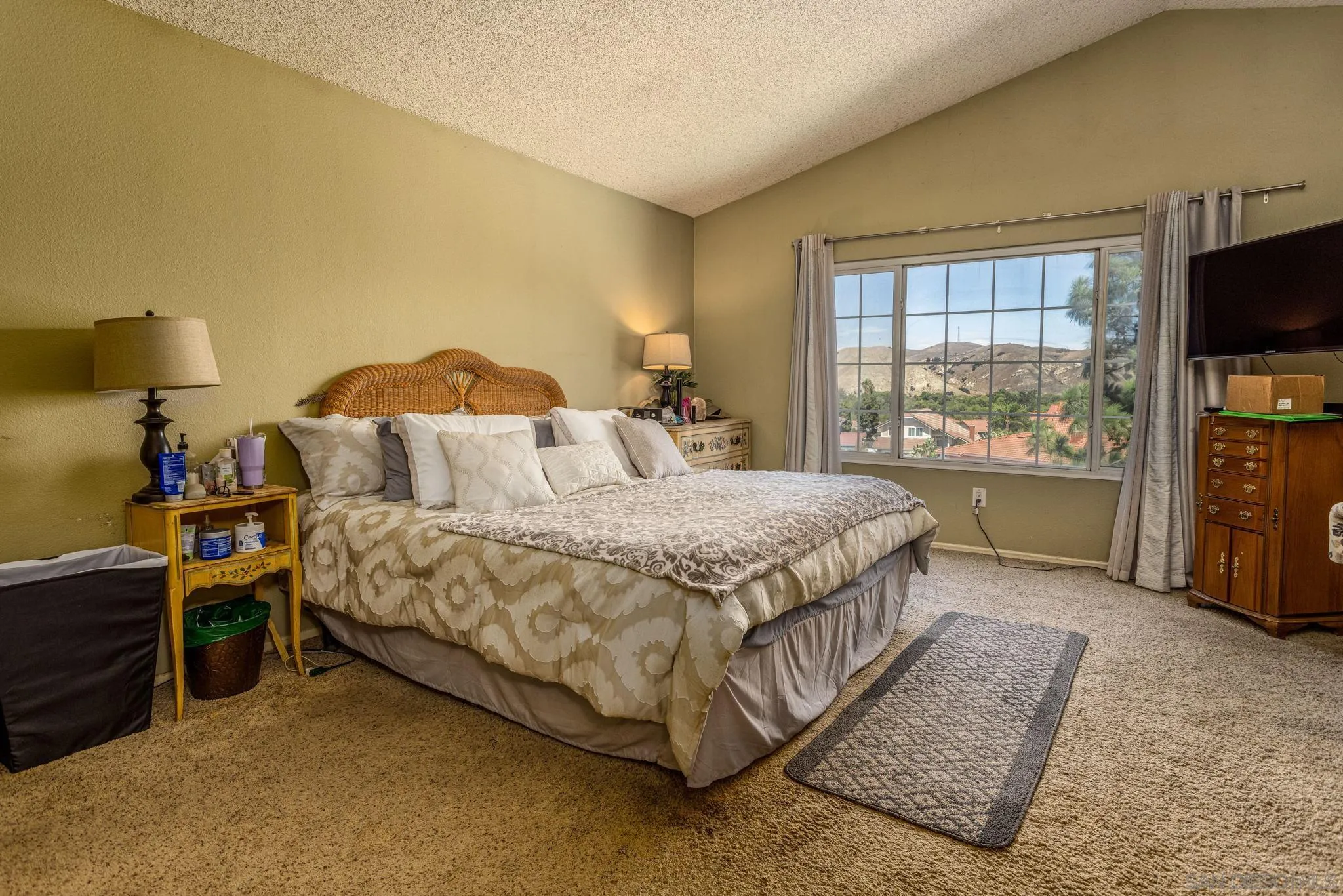 4648 Valley Glen Drive Corona, CA 92878 - Photo 21 of 42 a bedroom with a bed and a tv