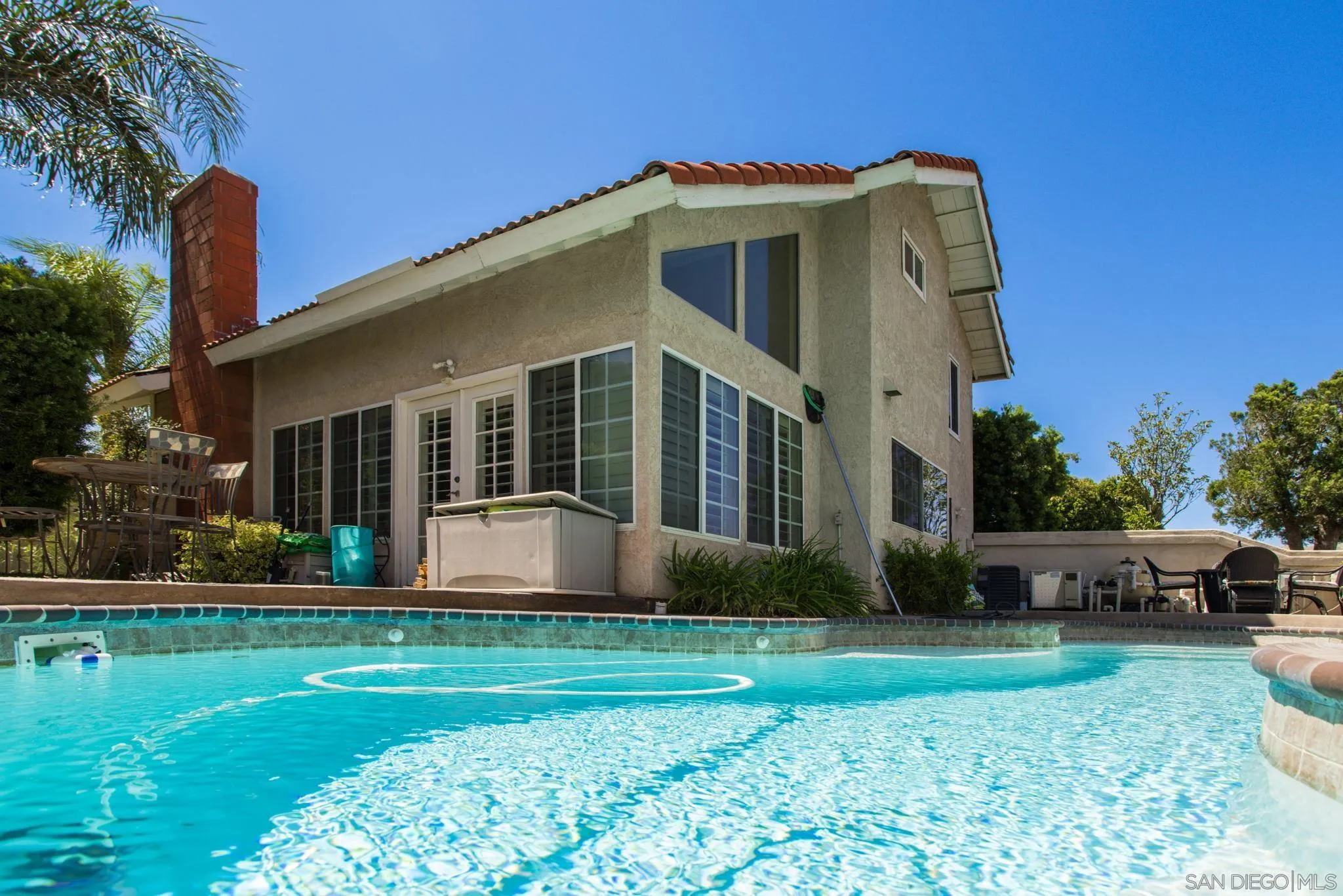 4648 Valley Glen Drive Corona, CA 92878 - Photo 27 of 42 a front view of a house with garden and porch
