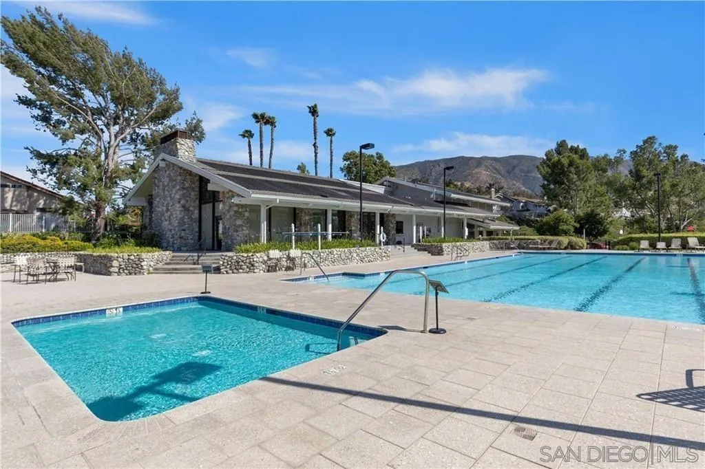 4648 Valley Glen Drive Corona, CA 92878 - Photo 37 of 42 a swimming pool with outdoor seating and yard