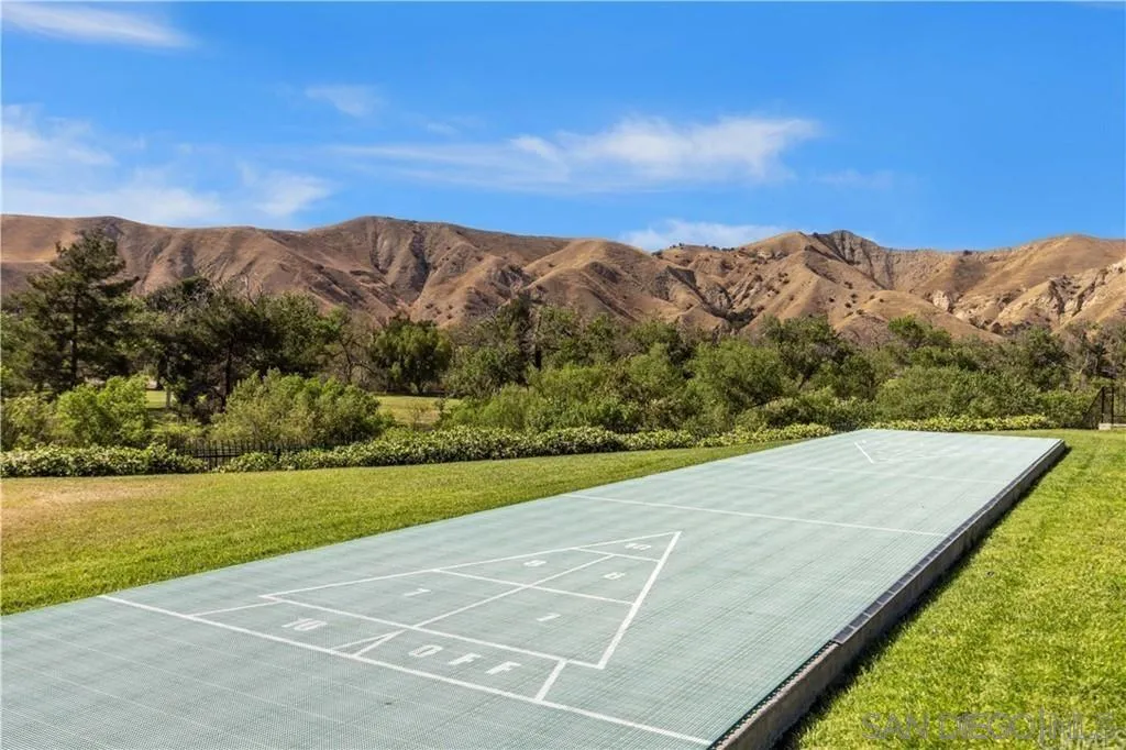 4648 Valley Glen Drive Corona, CA 92878 - Photo 41 of 42 a view of a tennis court with mountains in the background