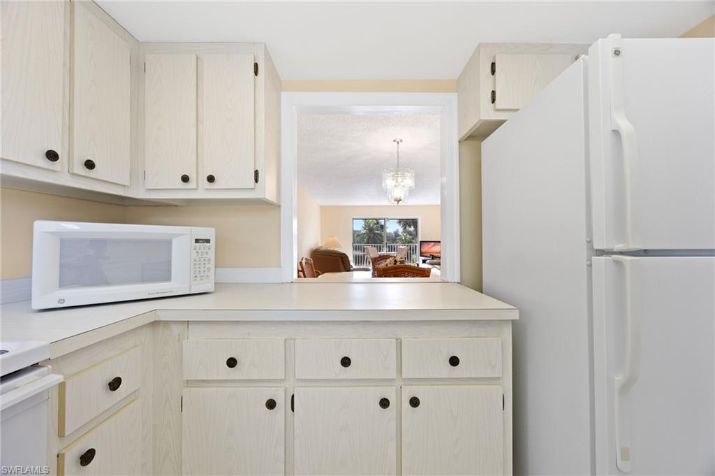 5683 Rattlesnake Hammock Road, Unit A202 Naples, FL 34113 - Photo 5 of 19 Gallery Image 5
