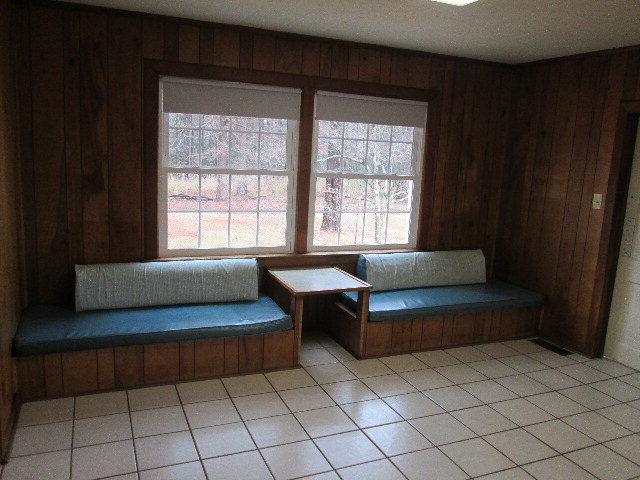 6121 Forsyth Road Macon, GA 31210 - Photo 11 of 17 a living room with furniture and a window