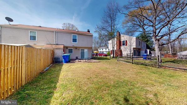 a view of patio with swimming pool
