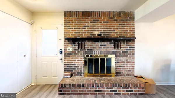 a view of livingroom with furniture and fireplace